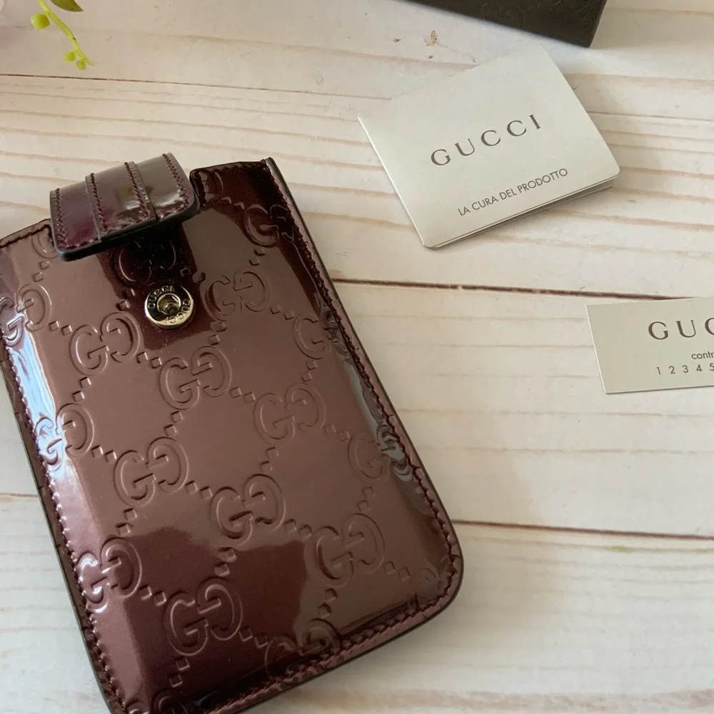 AUTHENTIC Gucci GG Patent Leather Embossed Case